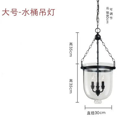 Retro black metal glass bucket pendant light with clear glass body and three candle-style bulbs for dining room decorbites glass bucket