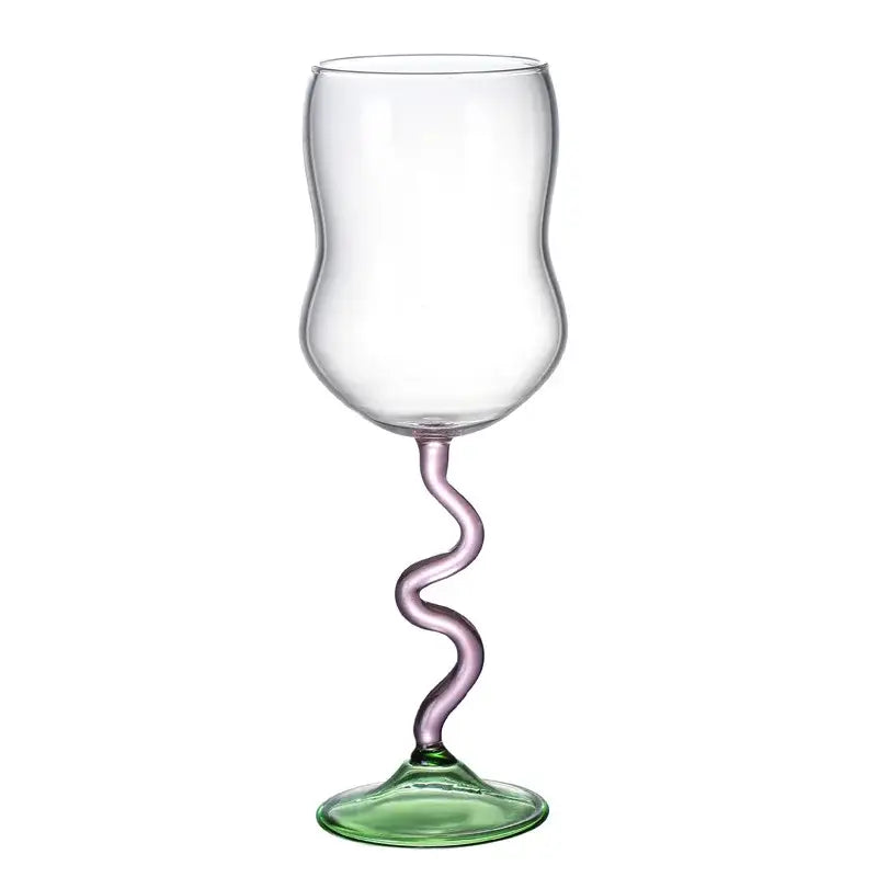 A clear glass wine glass with a twisted lavender glass twister stem and green base for dining room use