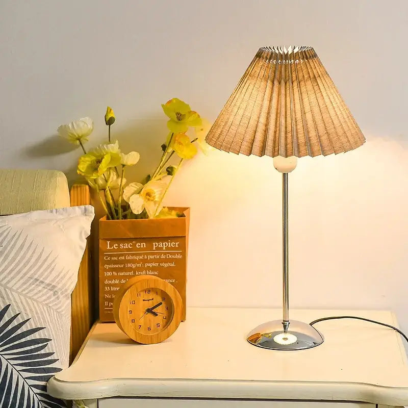 Retro brass and cream decorbites adjustable pleated table lamp with warm-toned pleated shade and metallic base for bedroom decor