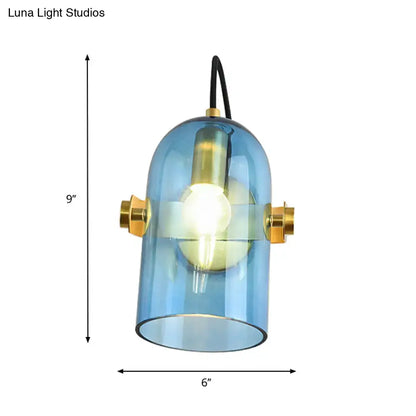 Retro brass cloche sconce light with blue glass smoke gray pendant and gold-toned hardware for bedroom use