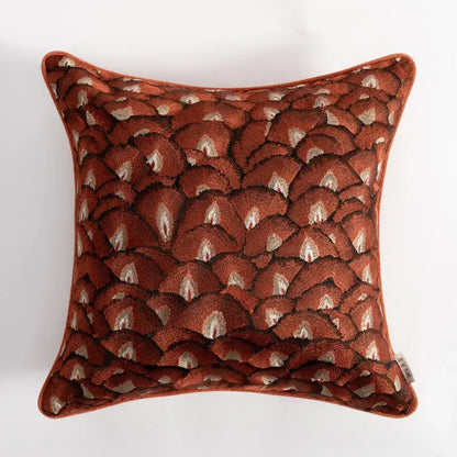 A rust-colored velvet retro brick red embroidered geometry pillow case with cream and dark brown fan-shaped motifs