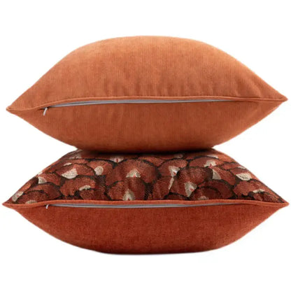 Two rust-colored throw pillows including an embroidered geometry pillow case with a leaf pattern for living room cushions