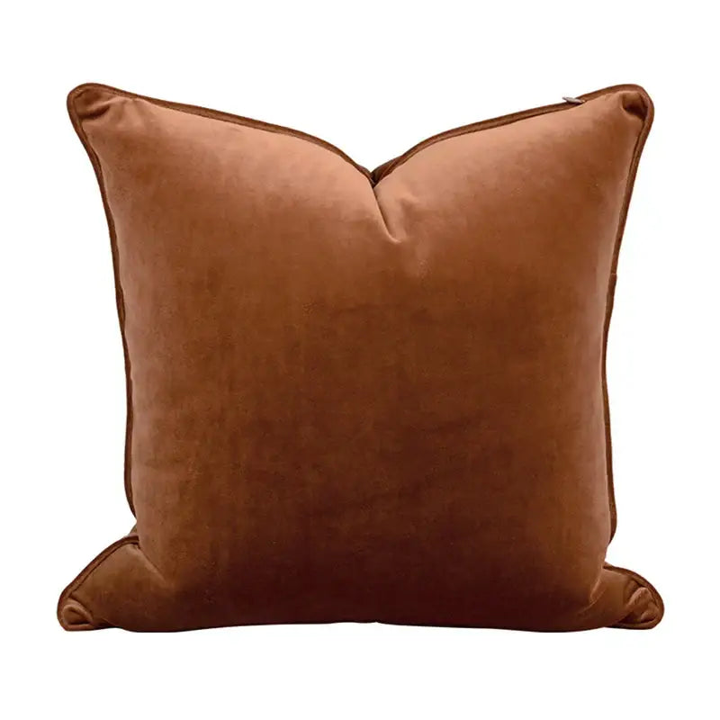 A plush caramel brown velvet pillow cover with neatly stitched edges for decorbites circus retro living room decor