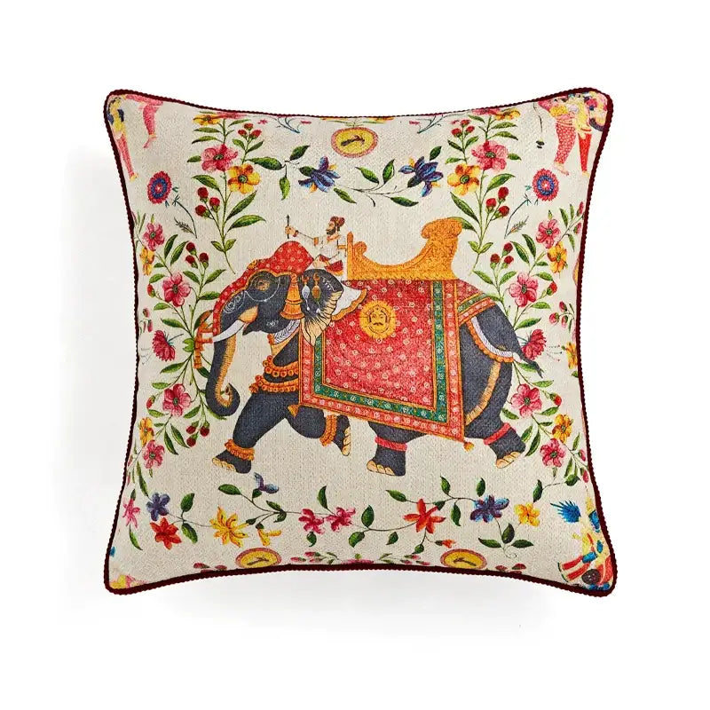 Square pillow cover featuring an intricately embroidered elephant with vibrant floral decorbites circus retro design on cream