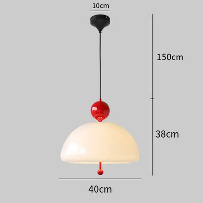 A modern pendant light with cream glass retro dome and red accents by decorbites for dining room decor
