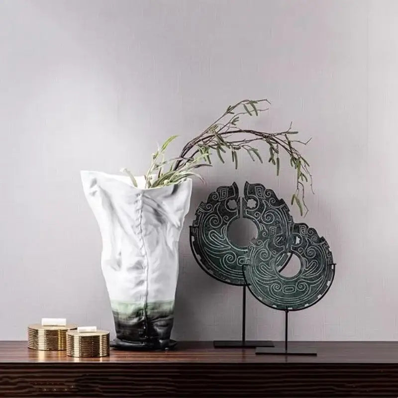 White ceramic vase with gradient green base and vertical seams as retro dark green geometric totem resin statue decorbites