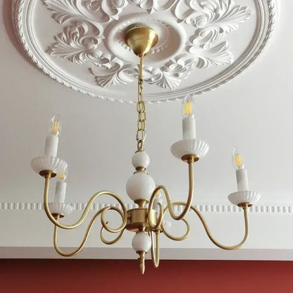 Retro decorbites cream white led chandelier with vintage brass curved arms and white ceramic candle holders for dining rooms