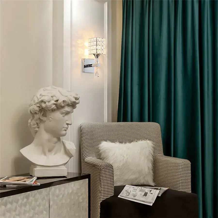 White marble bust of david with detailed curly hair as decorbites crystal wall sconce for living room lighting