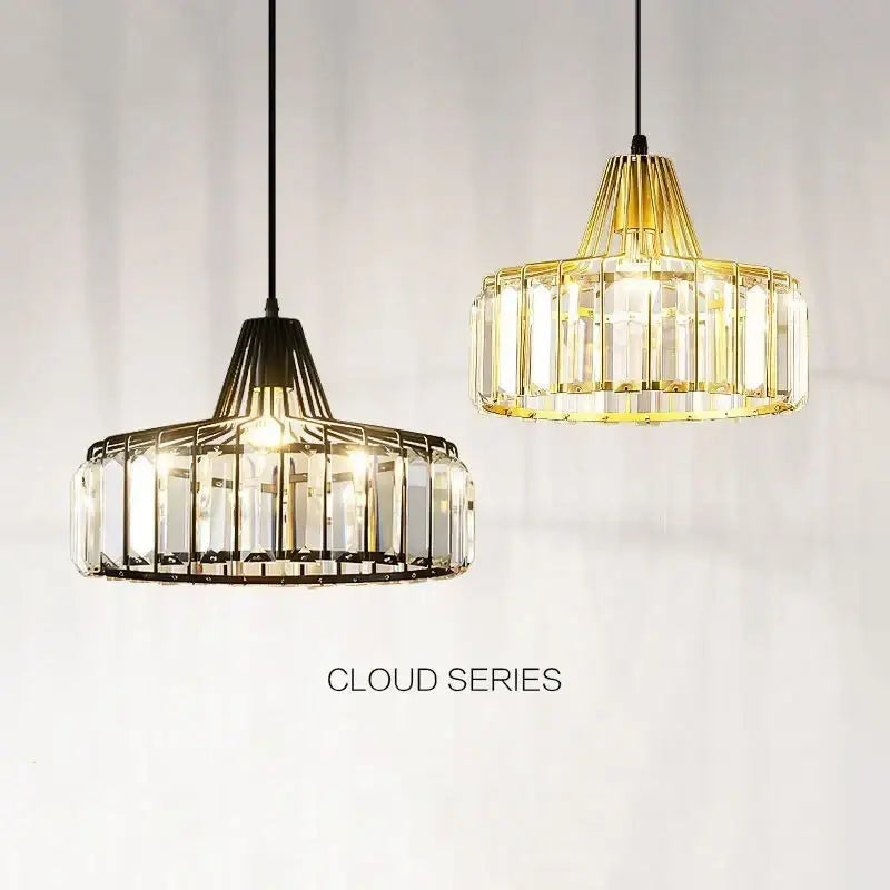 Two elegant gold-toned decorbites crystal led pendant lights with clear crystal prisms for dining room lighting