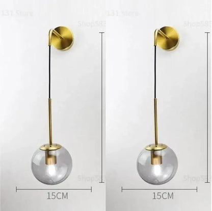 Retro gold glass ball wall lamp with gold-toned spherical pendant light and clear glass globe for bedroom decorbites glass ball