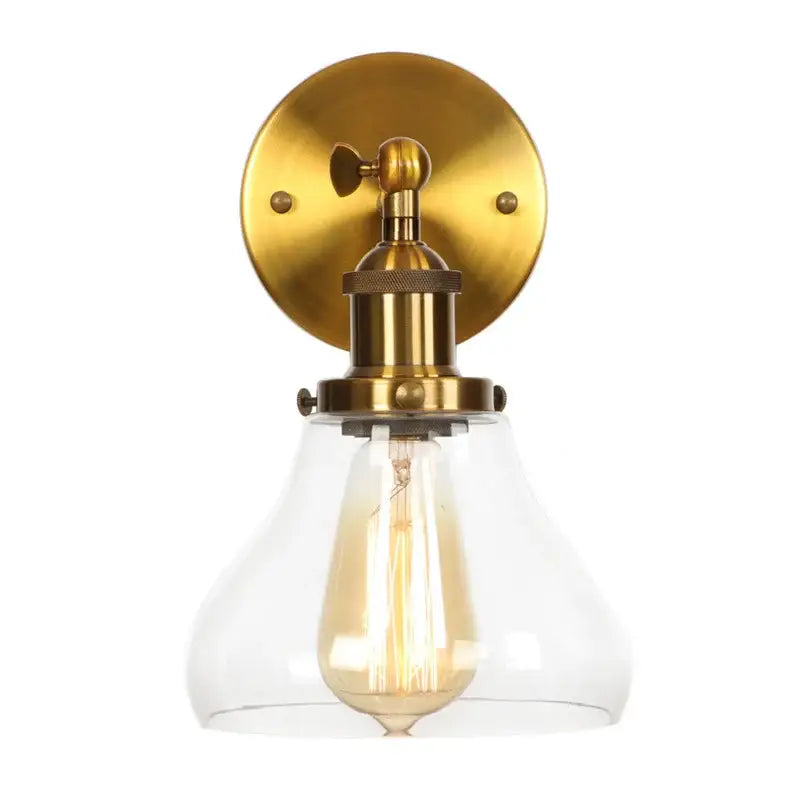 Brass-finished retro gold led wall sconce with clear glass shade and exposed filament bulb for bedroom decorbites gold led