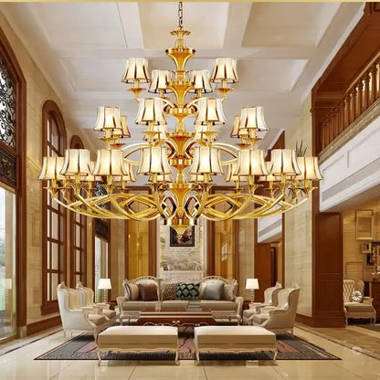 Retro golden copper villa chandelier with multiple tiers of cream lampshades by decorbites copper villa decorbites copper