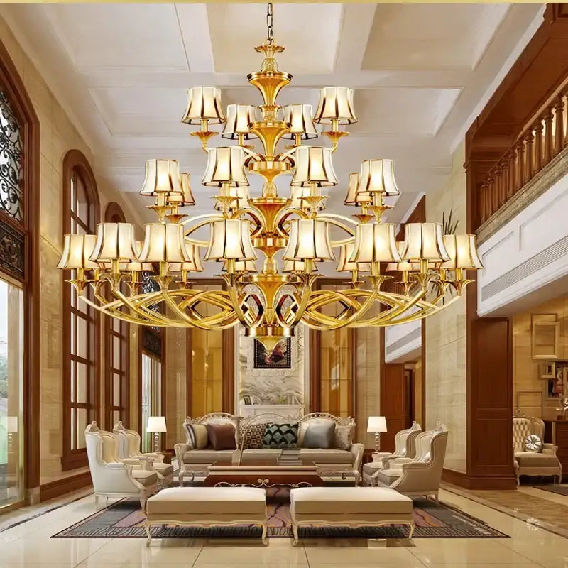 Retro golden copper villa chandelier with multiple tiers of cream lampshades by decorbites copper villa decorbites copper
