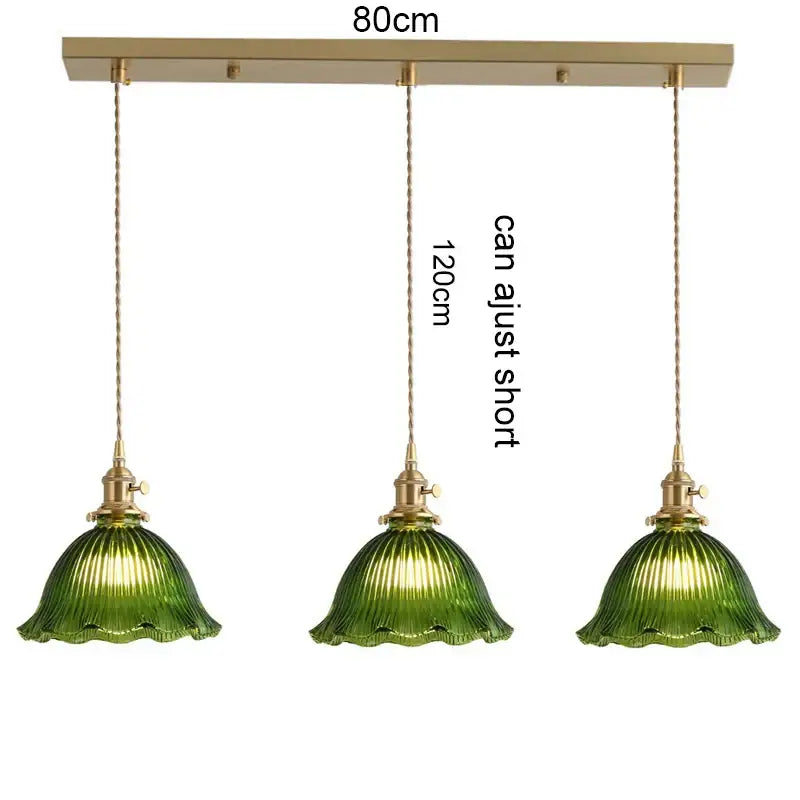 Retro green glass pendant light with wood accent features three green ribbed glass shades and brass fixtures for dining room uses with e27 led bulb compatibility