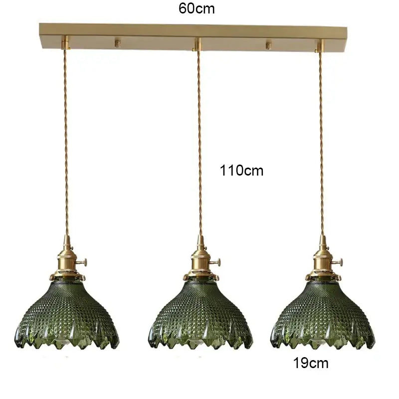 Set of three olive green textured glass pendant lights with brass fixtures and wood accent for dining room use with e27 led bulb