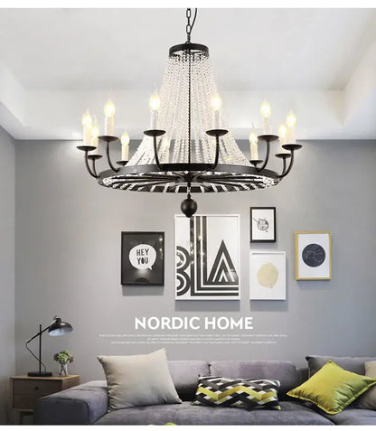 Black wrought iron decorbites crystal chandelier with cascading clear droplets and candle-style bulbs for dining room