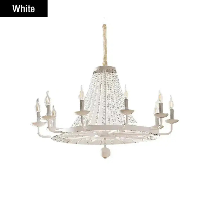 White decorbites crystal chandelier with crystal droplets and candle-style bulbs for dining room lighting
