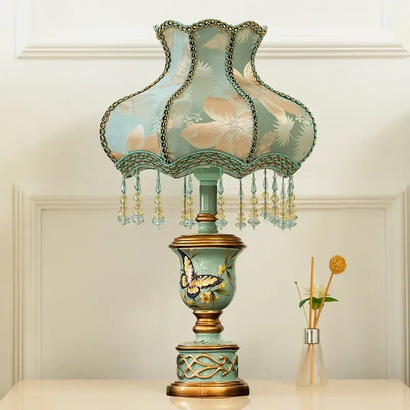 Retro mint green resin table lamp with butterfly detail and ornate scalloped embroidered shade for bedroom decorbites green resin