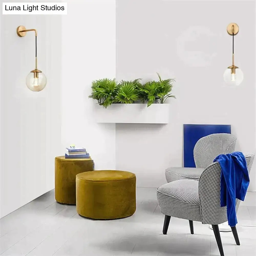 Gold-finished nordic retro modern wall lamp with clear glass smoked globe shade for bedroom lighting