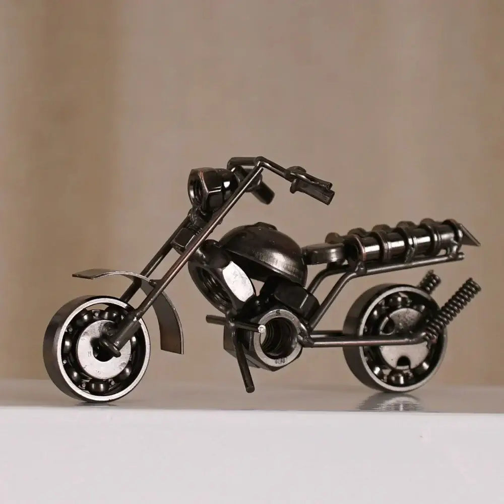 Black metal retro motorcycle model figurine crafted from repurposed industrial parts for living room decor