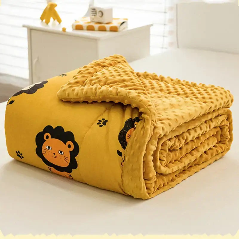 A cozy retro mustard cotton floral double quilt featuring cartoon lion faces and black paw prints for bedroom bedding