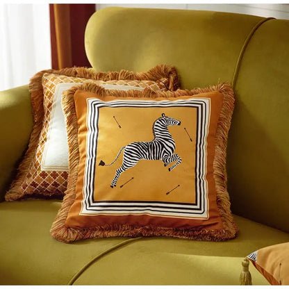 Orange velvet cushion cover with black and white zebra print and fringed edges for retro mustard decorbites italian retro decor