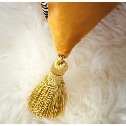 Golden tassel with silky shimmer and neat threads on retro mustard and zebra print cushion cover decorbites italian retro