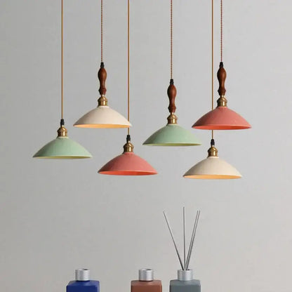 Retro pastel ceramic and brass chandelier light with wooden finials as decorbites brass chandelier for dining rooms