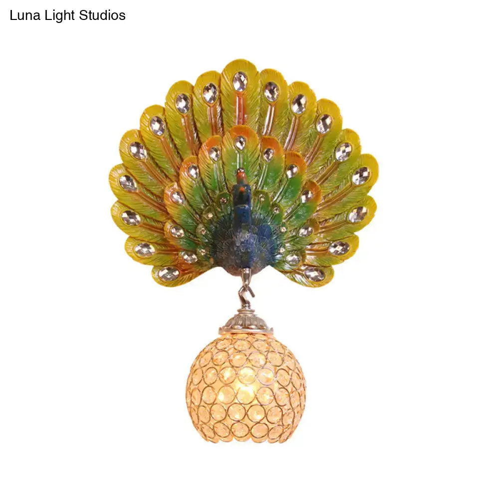 Retro peacock silver and white wall lamp featuring a peacock backplate with clear crystal and colorful feathers
