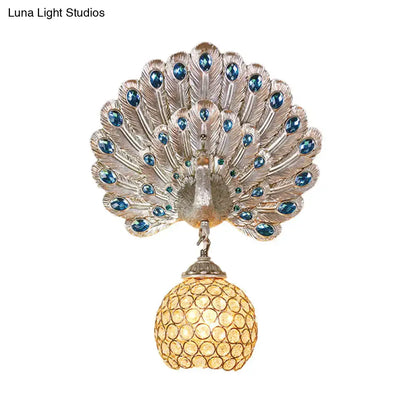 Silver peacock-themed wall lamp with clear crystal blue gemstone eyes and golden beaded globe shade for e26 e27 bulbs