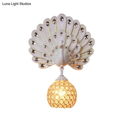 Retro peacock silver and white wall lamp with clear crystal rhinestones and a peacock backplate for living room use