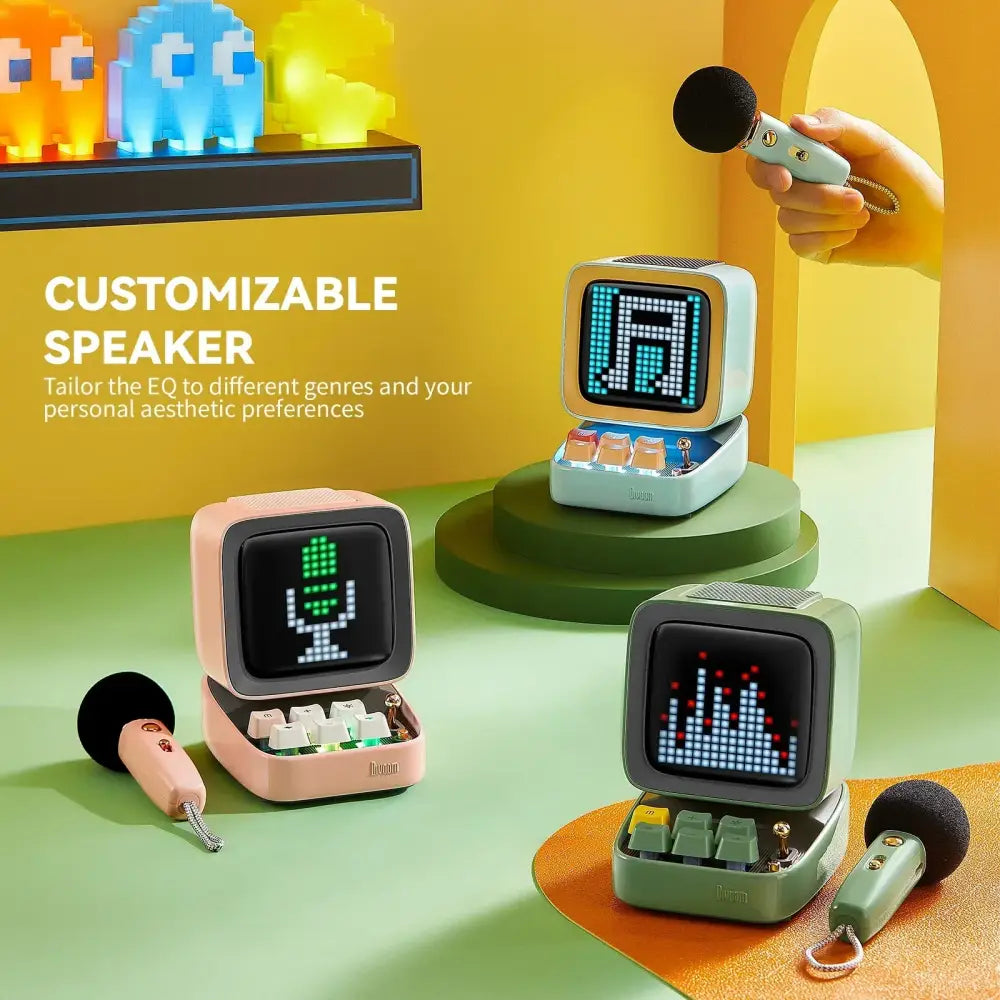 Pastel pink retro bluetooth speaker with pixelated display and physical knobs for sound modes and karaoke use