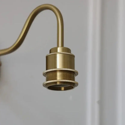 Brass-finished wall sconce with curved arm and threaded lamp holder for retro red tulip decorbites cube led wall lighting
