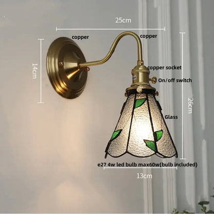 Vintage-style copper wall sconce with textured glass shade and green leaf motifs for decorbites cube led wall lighting