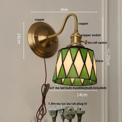 Vintage-style copper wall sconce with green and cream stained glass shade featuring diamond patterns for decorbites cube led bedroom light