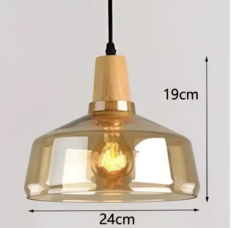 Warm-toned amber glass lampshade pendant light with wooden top and brass accents featuring an exposed edison bulb in set of 3