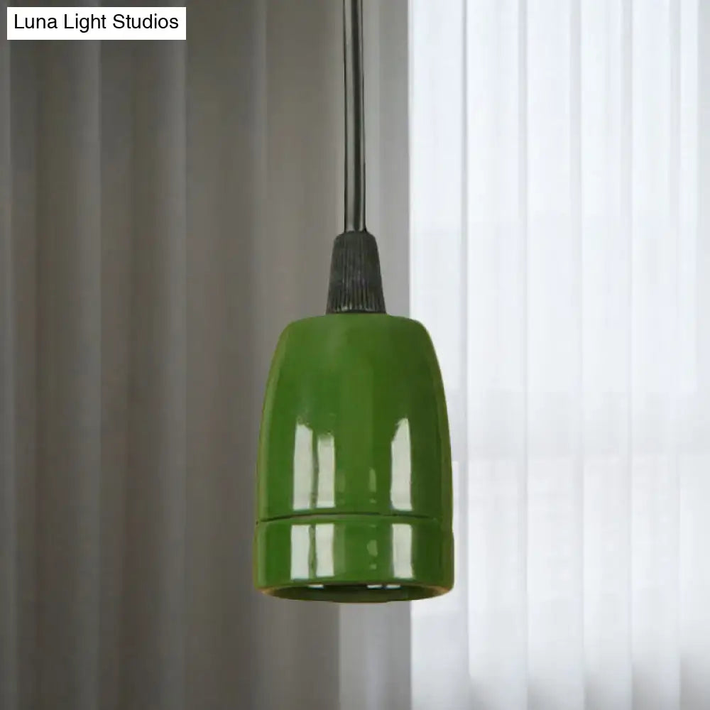 Decorbites™ retro style pendant light with glossy green ceramic shade and dark metal stem for ceiling use