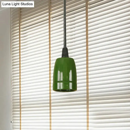 DecorBites™ retro style mini pendant light with adjustable black cord and glossy green ceramic fixture