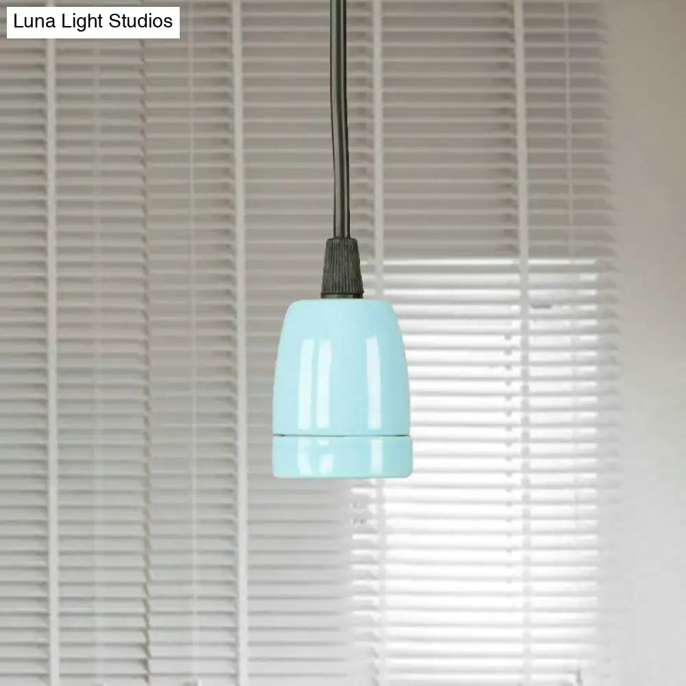 Decorbites™ retro style mini pendant light with sleek light blue ceramic shade and black cord for ceiling use