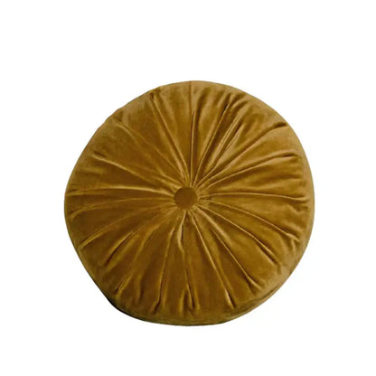A plush mustard-yellow velvet round cushion with gathered center design for decorbites american luxe retro cushion covers