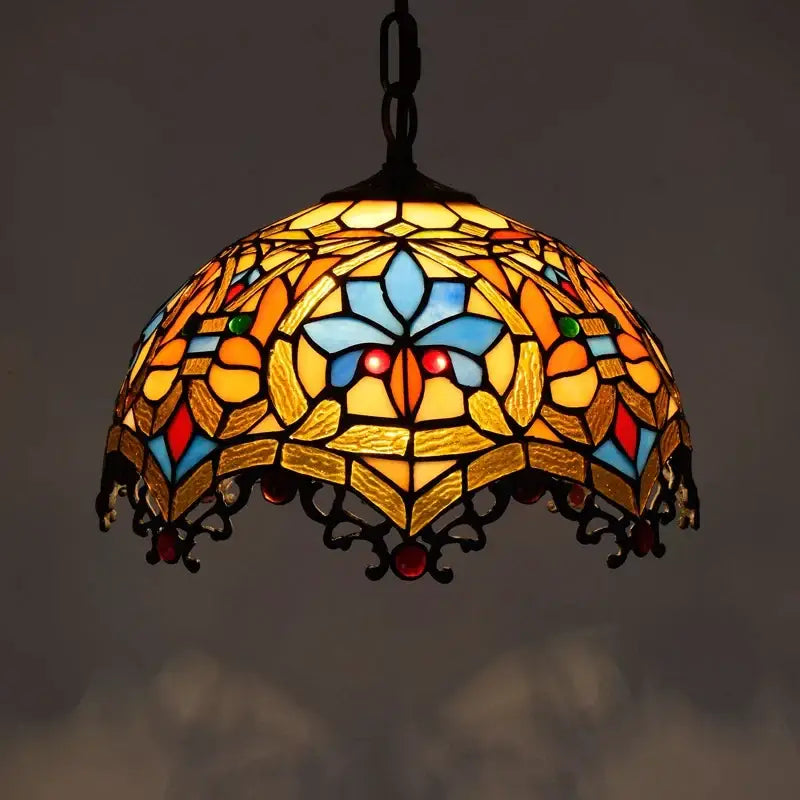 Retro Tiffany style colorful glass chandelier pendant light with vibrant floral stained glass and decorative black metal frame