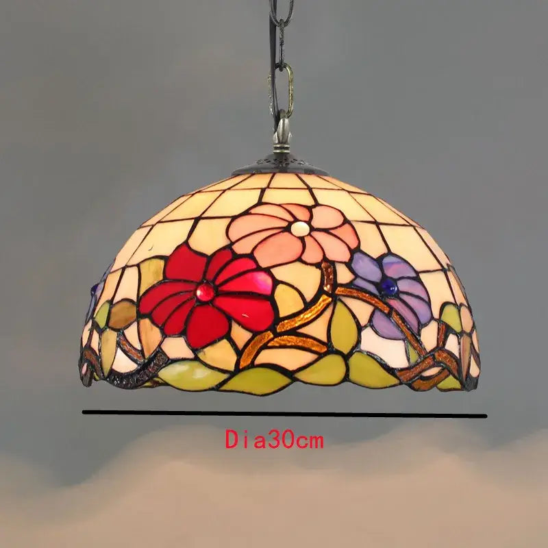 Retro tiffany style colorful glass chandelier with vibrant floral patterns in red pink purple and green for dining room decorbites colorful glass