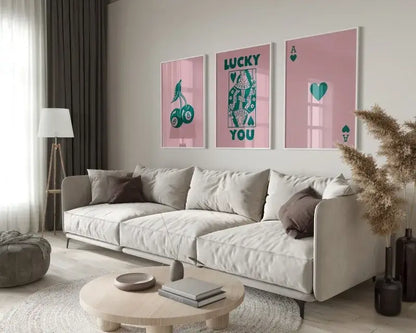Beige upholstered sectional sofa with dark brown throw pillows paired with decorbites retro wall art posters set queen of hearts theme