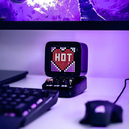 Black retro-style pixel art led display board with red heart and white text on bluetooth alarm clock screen