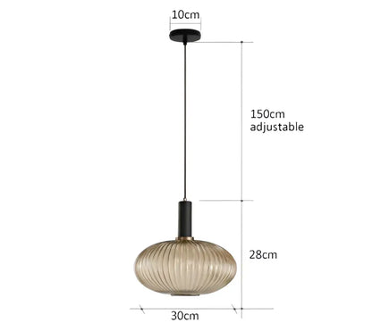 Modern pendant lights with ribbed amber glass shade and black metal hardware for dining room decorbites colorful glass