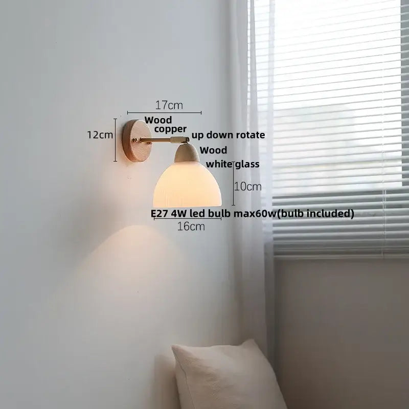 Warm-toned ribbed ceramic and wood wall sconce light with copper bracket and white glass shade for bedroom use