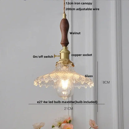 Vintage-style ribbed clear glass led pendant light with walnut wood handle and brass hardware for dining room decorbites