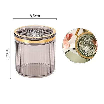 A sleek translucent gray ribbed acrylic seasoning jar with gold sunburst lid from decorbites acrylic seasoning jar set
