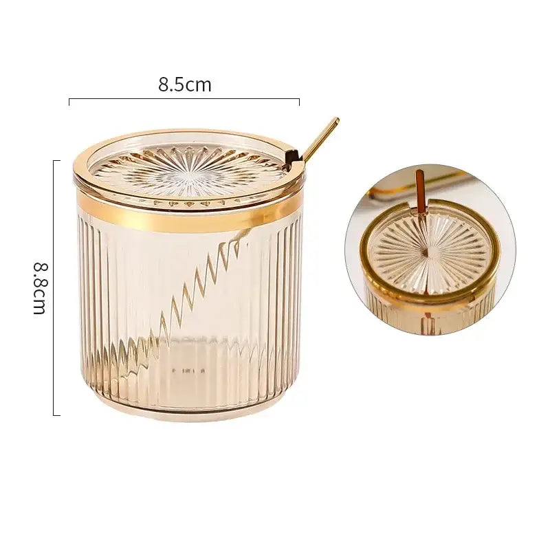 Gold-rimmed ribbed clear acrylic seasoning jar with embossed sunburst lid in decorbites acrylic seasoning jar set