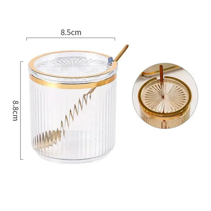 Clear glass acrylic seasoning jar with gold trim embossed sunburst lid and golden spiral spoon from decorbites seasoning jar set